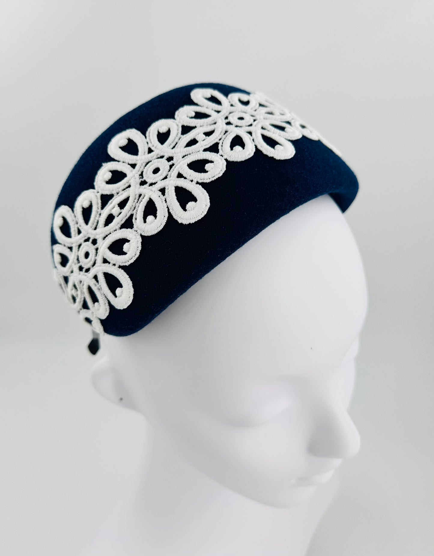 Navy wool felt bolero headband with white lace appliqué